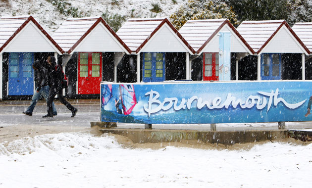 Snow in March: Snow settles on the beach at Bournemouth in Dorset, March 2009. 