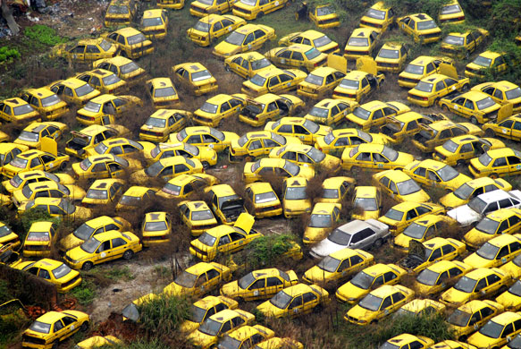 24 hours in pictures : Thousands of scrapped taxis in a yard in Chongqing, China 