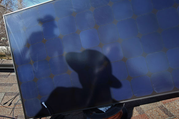 24 hours in pictures : solar energy panels are installed on colorado homes