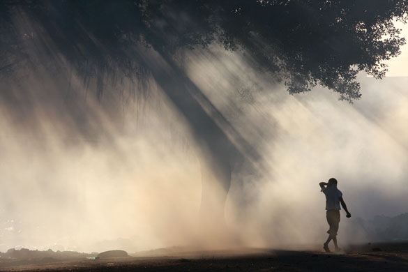 24 hours in pictures: garbage fire in Managua, Nicaragua