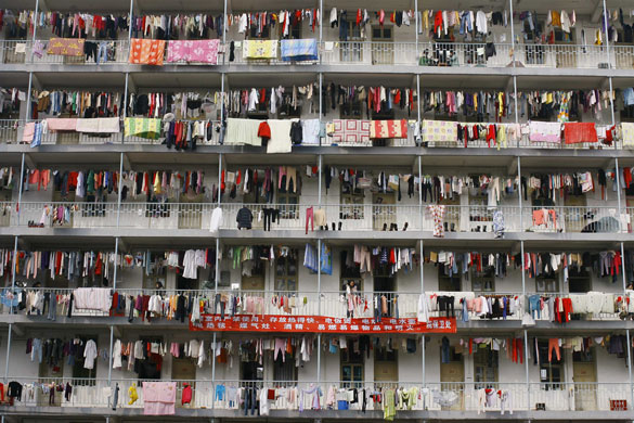 24 hours in pictures: Laundry hangs outside a student dormitory at a college in Wuhan
