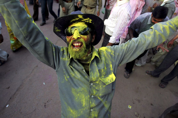 24 hours in pictures: Lathmar Holi festival in India