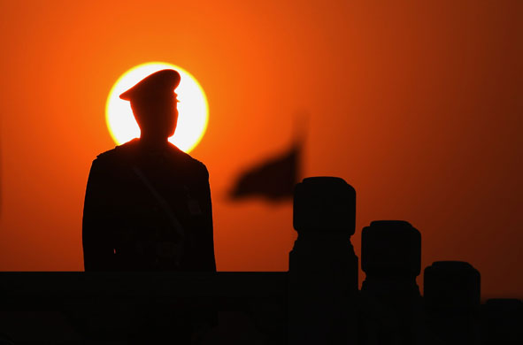 8 March 2009: Beijing, China: A paramilitary policeman stands guard at Tiananmen Square