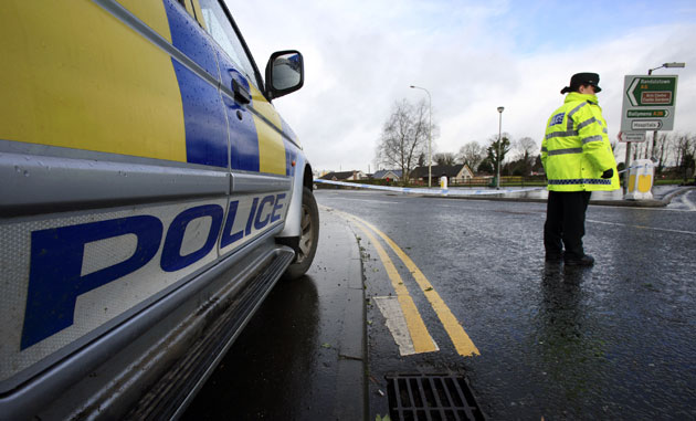 Northern Ireland shooting: Police close off the road leading to Massereen Army base