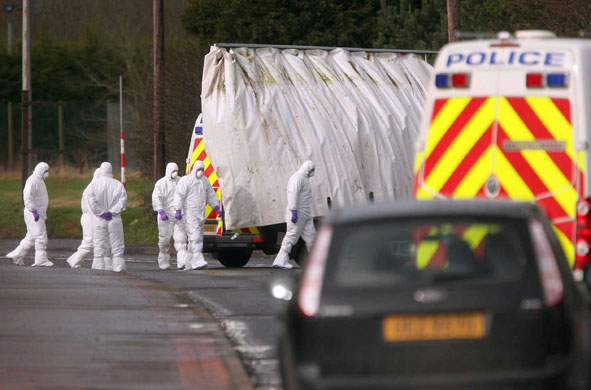 Northern Ireland shooting: Police forensic experts attend the scene