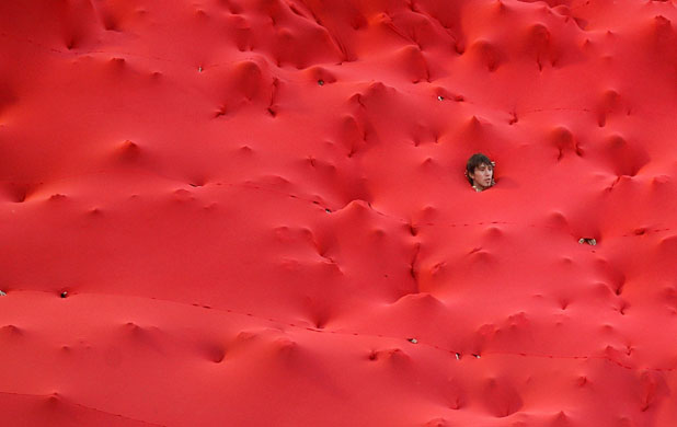 24 hours in pictures: An Independiente supporter in Buenos Aires