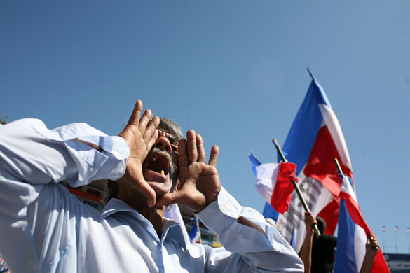 24 hours in pictures: A supporter of the Nationalist Republican Alliance,  in El Salvador