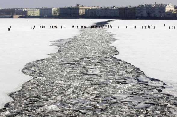 24 hours in pictures: People walk across the melting ice of the Neva River in St. Petersburg