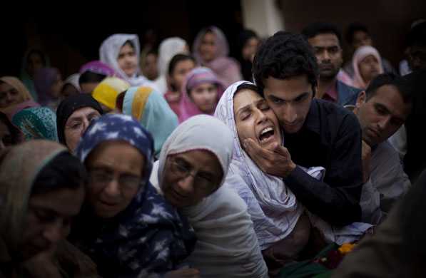 Eyewitness: Relatives of Raheel Fayz, killed in the assault on a police academy