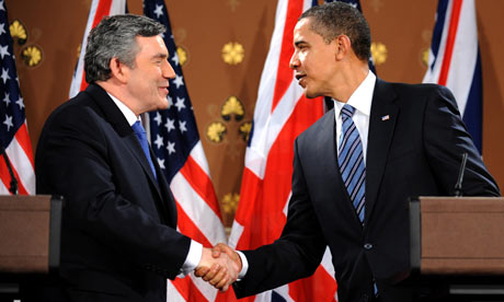 Barack Obama and Gordon Brown shake hands at a press conference