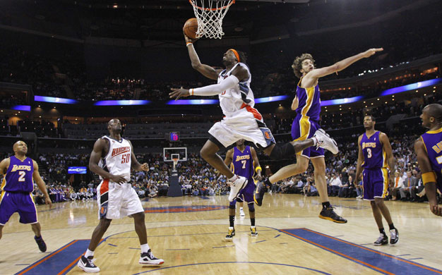 Sport: 24 Hours: Charlotte Bobcats forward Wallace shoots during NBA game in Charlotte