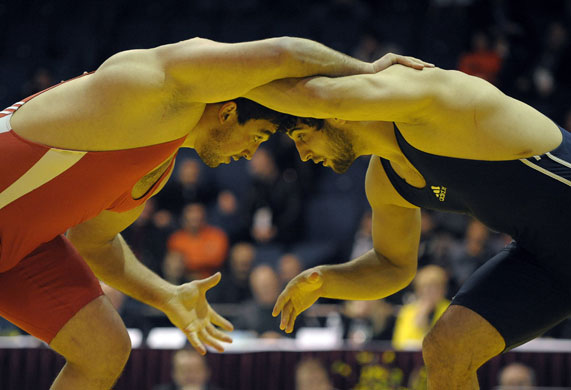 Sport: 24 Hours: Ruslan Basiev from Armenia fights with Ali Isayev from Azerbaijan