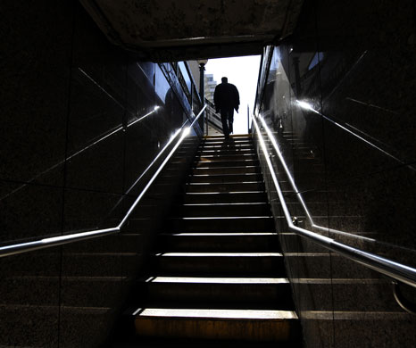 1 April 2009: New York, US: A subway rider exits the New York City Subway