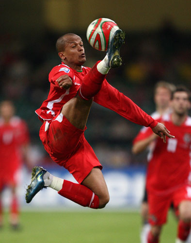 World Cup 2010 Qualifiers: Robert Earnshaw jumps up to control a ball