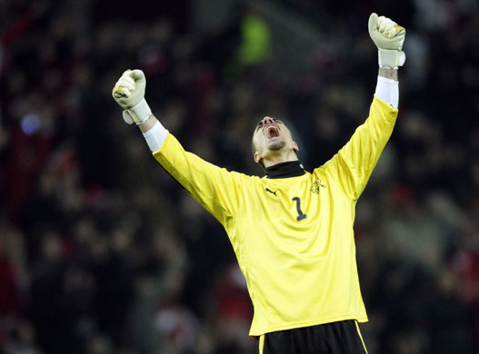World Cup 2010 Qualifiers: Switzerland's goalkeeper Benaglio celebrates team's second goal 