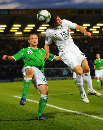 World Cup 2010 Qualifiers: Warren Feeney and Slovenia's Bojan Jokic tussle for the ball in Belfast 