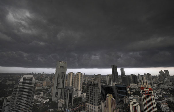 24 hours in pictures: Bangkok, Thailand: Rain clouds gather over the city skyline