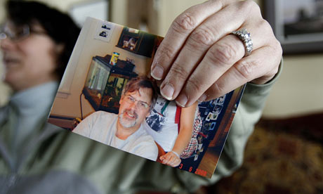 Andrea Phillips holds a photo of her husband, Captain Richard Phillips.