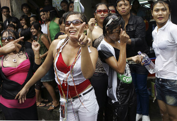 Burma water festival: Residents participate in the annual water festival  in Ranggon, Burma.