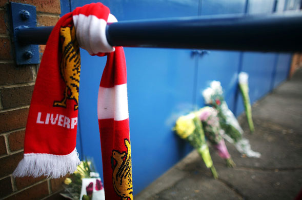 Hillsborough memorial: Floral tributes and Liverpool scarves lay in tribute