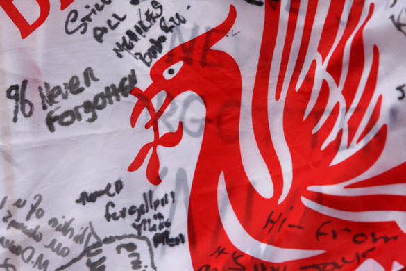 Anfield memorial service: A flag on the Shankly Gates before the official memorial service