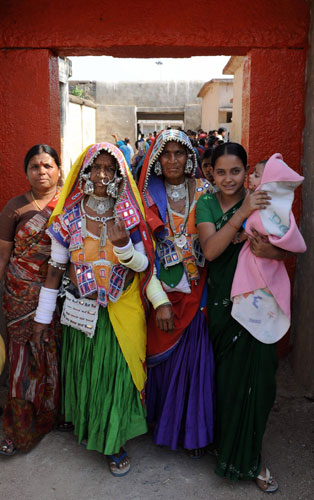 Elections in India: Lambadi tribal women leave a polling booth in the  Rangareddy District