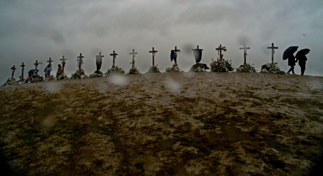 Columbine shootings: A couple visit 15 crosses placed on a hilltop near Columbine High School