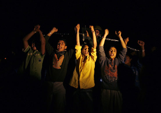 24 hours in pictures: Palestinian boys take part in a protest in Gaza