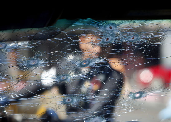 24 hours in pictures: The car in which activist Sondhi Limthongkul was attacked in Bangkok