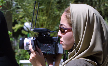 Jailed US-Iranian journalist Roxana Saberi taking footage in Tehran