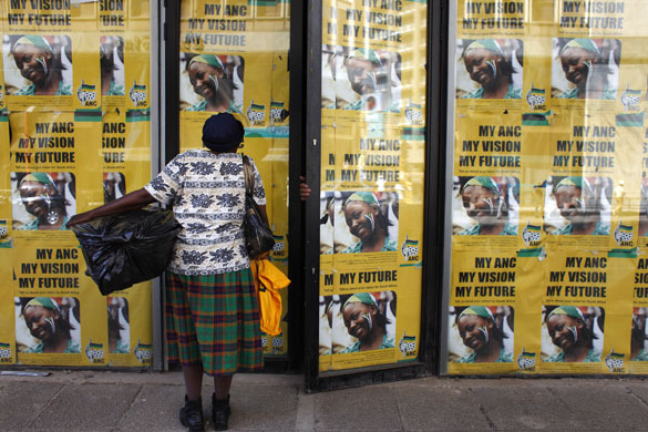 South Africa elections: A woman stands outside the ANC headquarters, in downtown Johannesburg.
