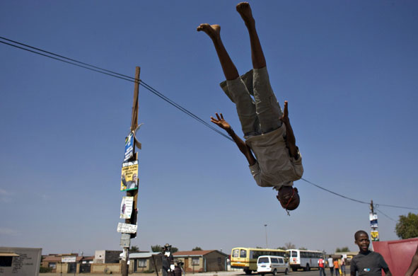 South Africa elections: A boy does a flip on a trampoline in Johannesburg