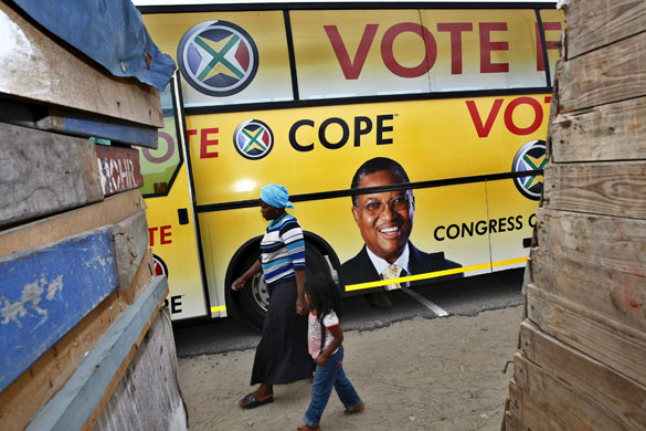 South Africa elections: (COPE) bus during its campaign in DuNoon shack settlement 