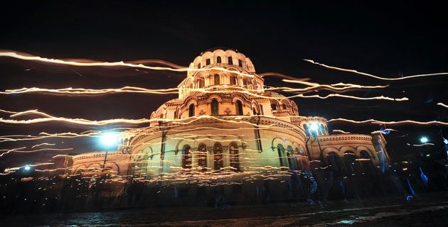 24 hours in pictures: Sofia, Bulgaria: People walk with candles near Alexander Nevski cathedral.