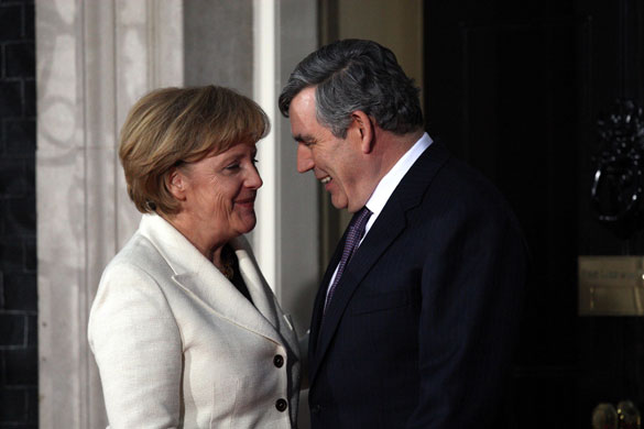 G20 leaders dinner: Angela Merkel is greeted by Gordon Brown, as she arrives to a G20 dinner