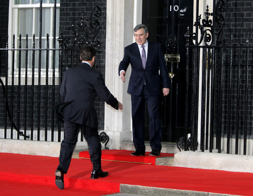 G20 leaders dinner: Nicolas Sarkozy is greeted by Gordon Brown