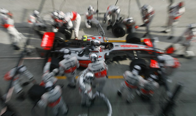 24 Hours in pictures: McLaren Formula One crew conducts a pit stop practice