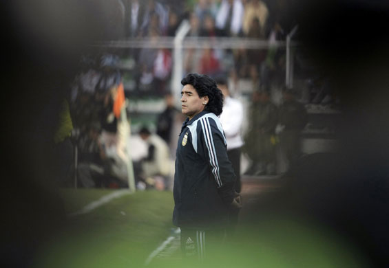 24 Hours in pictures: Diego Maradona looks on during Argentina's 2010 World Cup qualifying match