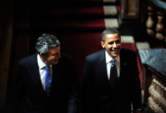 2 April 2009: London, UK: Barack Obama and Gordon Brown arrive for a press conference