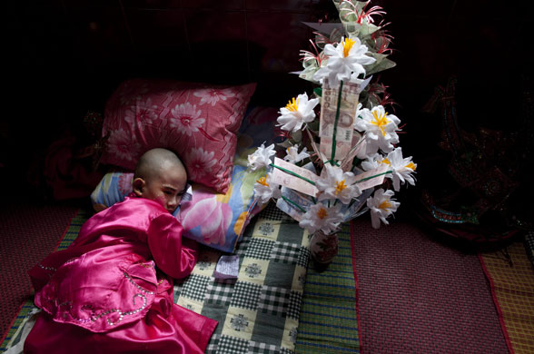 2 April 2009: Tachilek, Myanmar: Bhuddhist novice ordination at Mahamyat Muni monastery