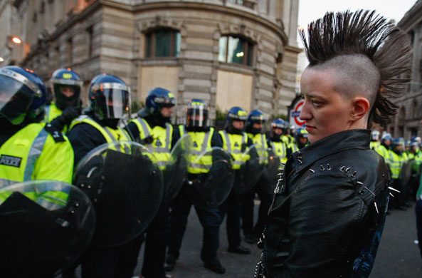 2 April 2009: London: A protester contemplates a police line outside the Bank of England