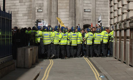 Police hold G20 protesters outside the Bank of England