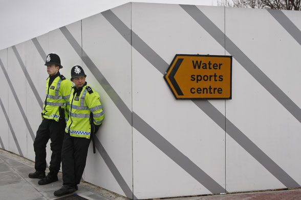 G20 protests day two: Police officers wait for demonstrators to arrive close to the ExCel Centre 