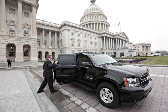 Week in Business: A black Chevy Suburban SUV, manufactured by financially threatened GMC.