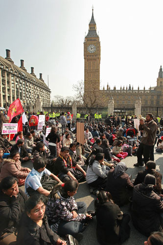 Tamil protest in  London : tamil protesters block the road outside the houses of parliament