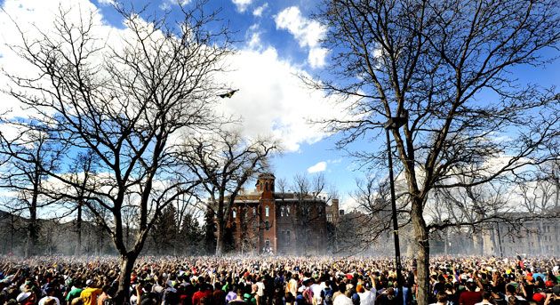 24 hours in pictures : Students smoke cannabis at the annual 420 event in University of Colorado 