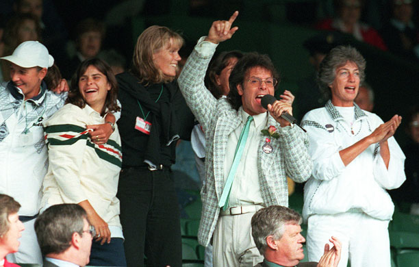 Wimbledon new roof: Sir Cliff Richard leads the community singing on Centre Court at Wimbledon.