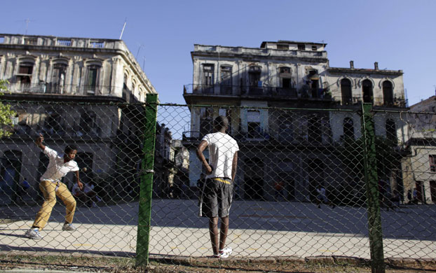 24 hours in pictures: Boys play handball in a park in Old Havana