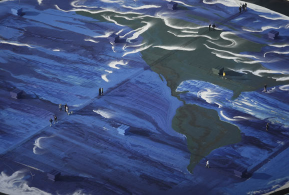 24 hours in pictures:  Robert Wyland's painting of a three-acre image of planet Earth