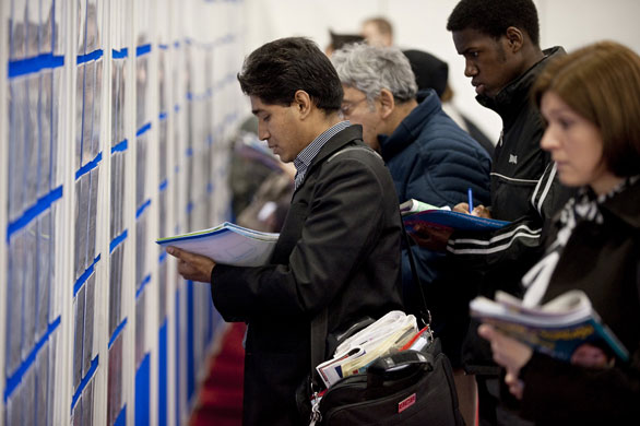 Week in business: Job seekers at a Graduate Recruitment Fair in London.